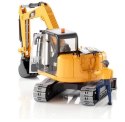Minikoparka CAT z figurka robotnika Minikoparka CAT z figurka robotnika